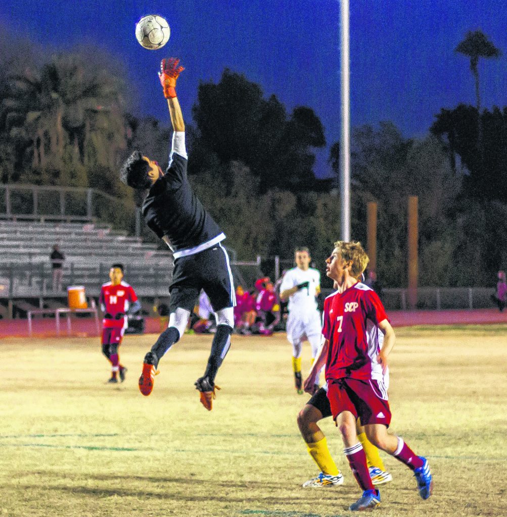 Seton Catholic's number 7 helped goalie Freddie Alexander and the Sentinels emerge as winners in the game against Marcos de Niza. (Wrangler News/Alex J. Walker)