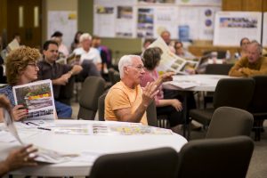 Supporters and those in opposition of the new South Tempe apartments express their views at a public forum held in late 2014. [Photo Billy Hardiman/Wrangler News]