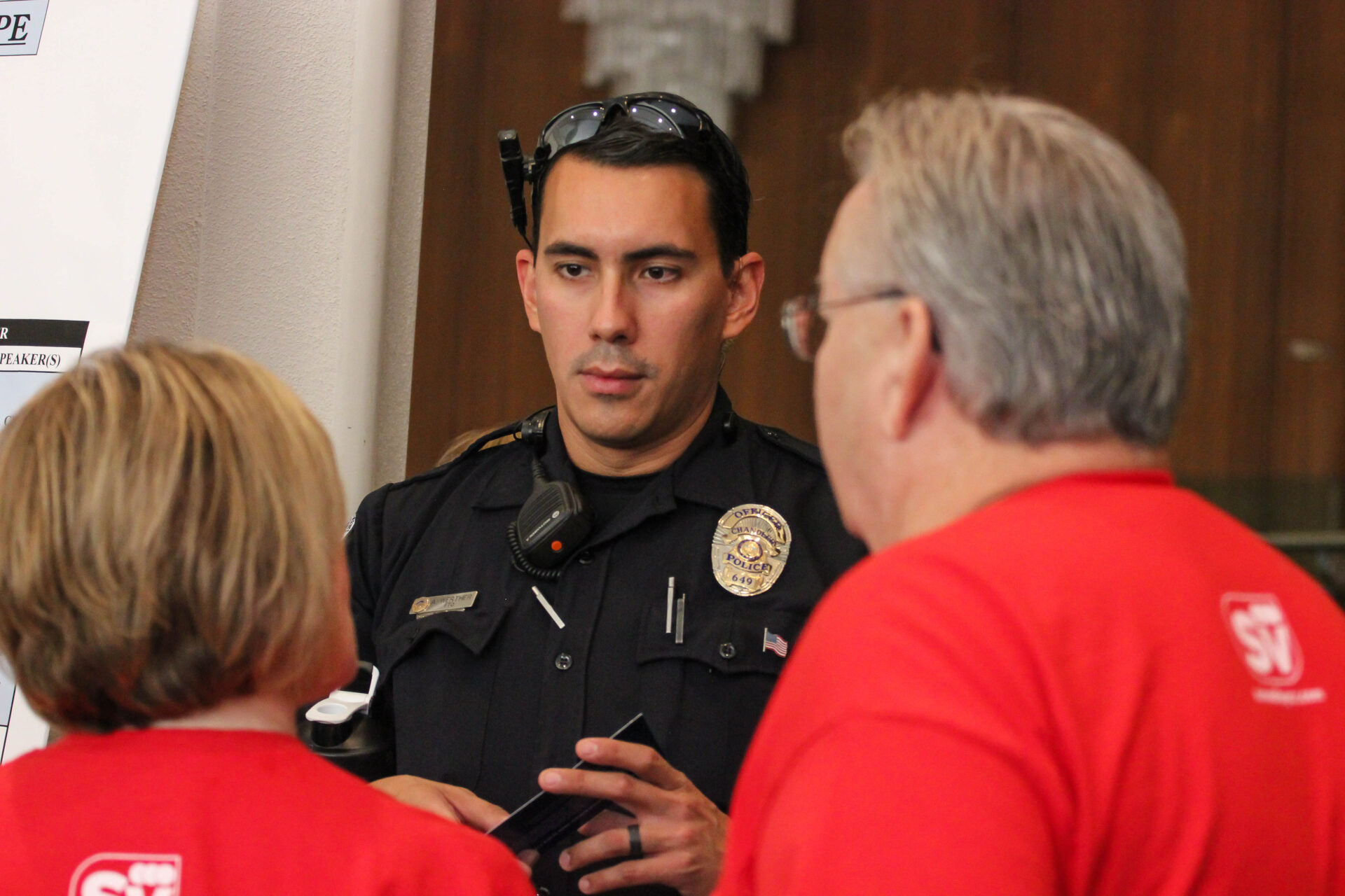 Officer Ariel Werther talked with conference-goers.  (Wrangler News photo by Alex J. Walker)