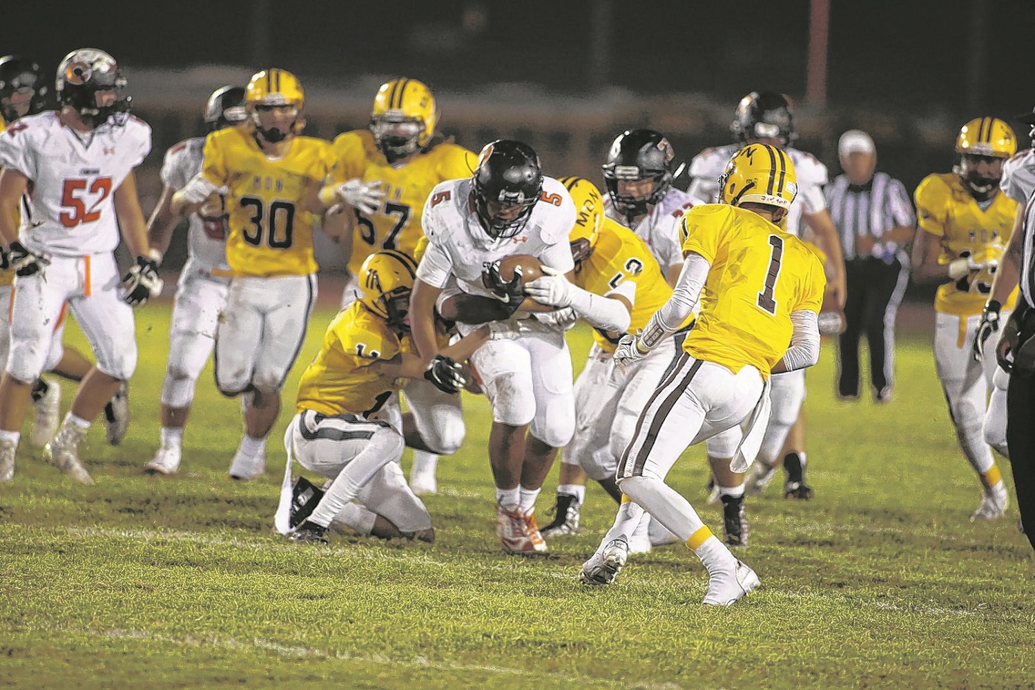 Corona del Sol Aztecs' #5 Cameron Brice breaking tackles vs. Marcos de Niza.  Kris Cartwright for Wrangler News/More at kriscartwright.smugmug.com  