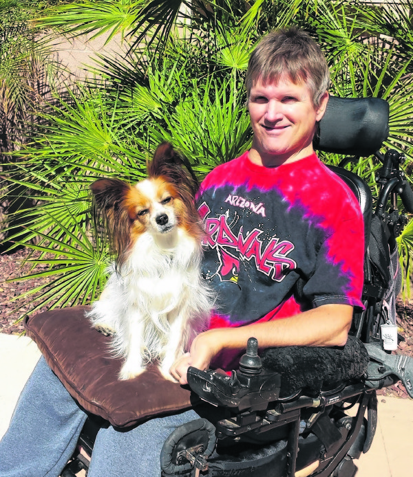 Greg Wickenburg and his faithful companion, Roo, are hoping for a new set of wheels. 