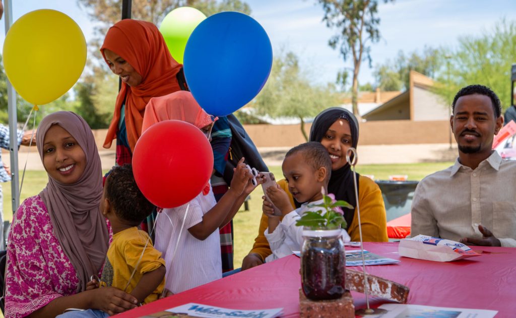 family enjoying themselves with balloons 