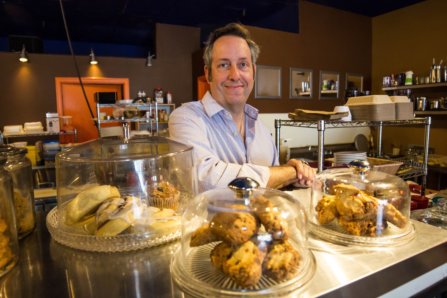 Coffee entrepreneur Steve Schmidt with just a few of the tasty treats he offers--with an even wider selection on the way. Wrangler News photo by Alex J. Walker 