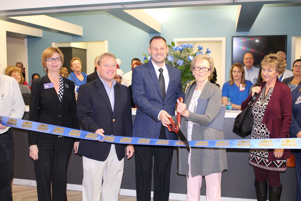 Gathering to celebrate the opening of the remodeled second-floor surgical unit at Tempe St. Luke's Hospital were, from left, Mary Ann Miller, Tempe Chamber president; Tempe Mayor Mark Mitchell; Hospital Administrator Jake Golich.  The event commemorated pioneering physician Dr. Ernest von Pohle, whose daughter Ellen Hardin cut the ribbon. 