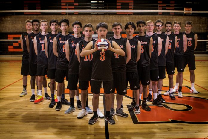 volleyball team gathered for group photo