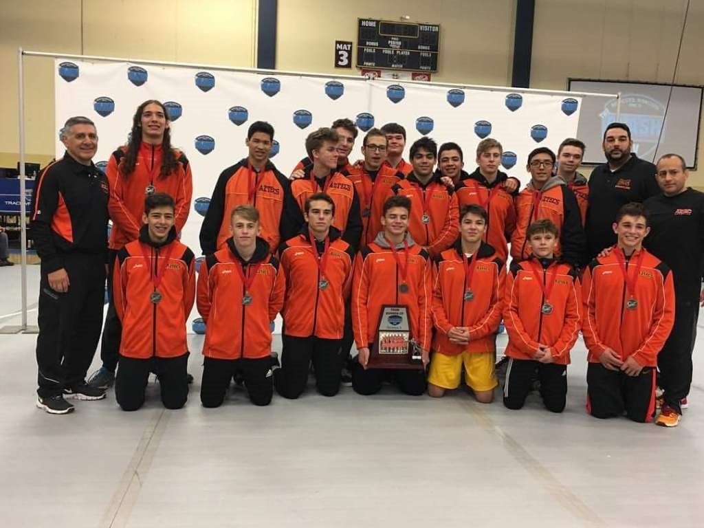 Corona's wrestling team took second place at the prestigious Clash wrestling tournament in Rochester, Minn. over the holiday break. (Photo courtesy Coach Jim Martinez)