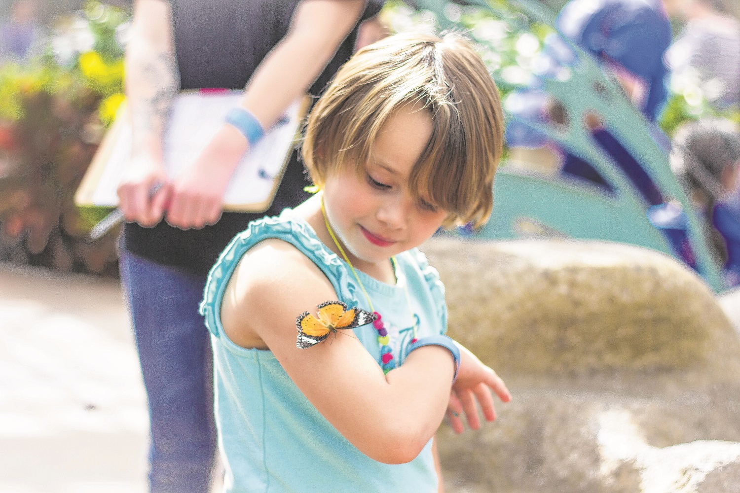 A spring-break visit to Butterfly Wonderland offered youngsters a chance to get up close and personal with nature's winged beauty. (Wrangler News/Alex J. Walker)