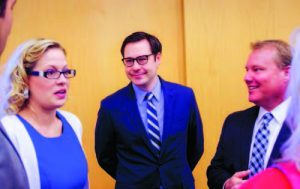 U.S. Rep. Kyrsten Sinema with Tempe Mayor Mark Mitchell, right, and Mitchell aide Tony Cani at a State of the District address Feb. 17 to members of the Tempe Chamber of Commerce. [Photo Joyce Coronel/Wrangler News]