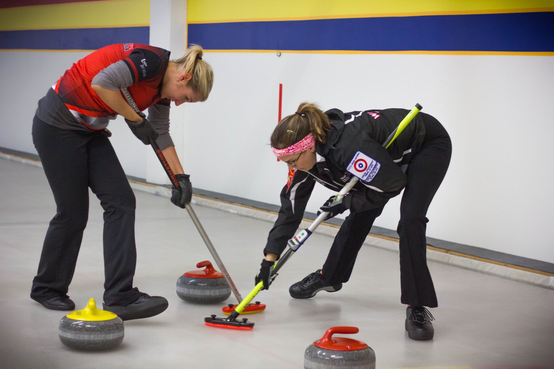 Members of Coyotes Curling Club hone their skills at Tempe Ice rink. Wrangler News photo by Alex J. Walker