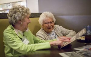 Marian Lober, 82, and Irene Groves, 92, teh Hanger sisters, both look back on memories from their Kyrene Elementary days. [Billy Hardiman/Wrangler News]