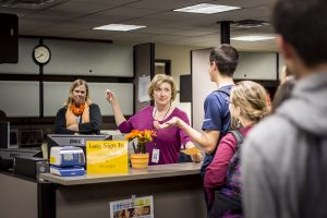 At Corona del Sol High School, excuses for getting to the campus late can meet tough resistance from attendance office enforcers like Mary Bradshaw. [Billy Hardiman/Wrangler News]